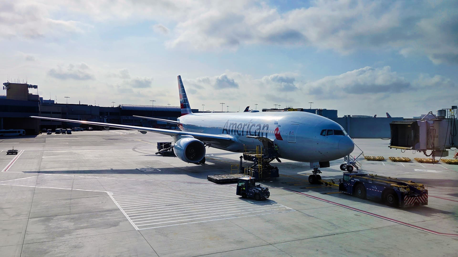 American Airlines Boeing 777 stands at the gate in Los Angeles.
