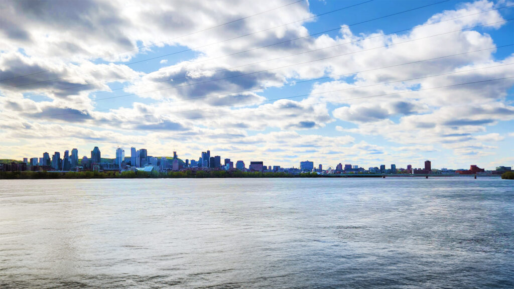 Montreal skyline seen from a river.